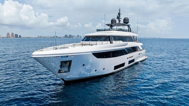 Slide: The Image of Luxurious 2024 Custom Line Navetta 33 yacht cruising on open sea. - 1