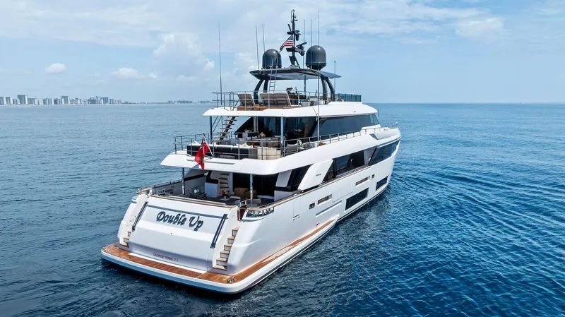 Slide: The Image of Luxurious 2024 Custom Line Navetta 33 yacht cruising on open sea. - 11