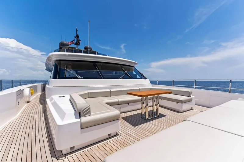 Slide: The Image of Luxurious 2024 Custom Line Navetta 33 yacht with spacious deck seating and ocean view. - 30