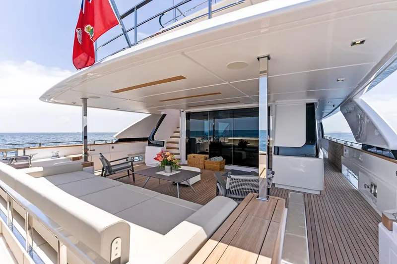 Slide: The Image of Luxurious 2024 Custom Line Navetta 33 yacht deck with elegant seating and ocean view. - 32