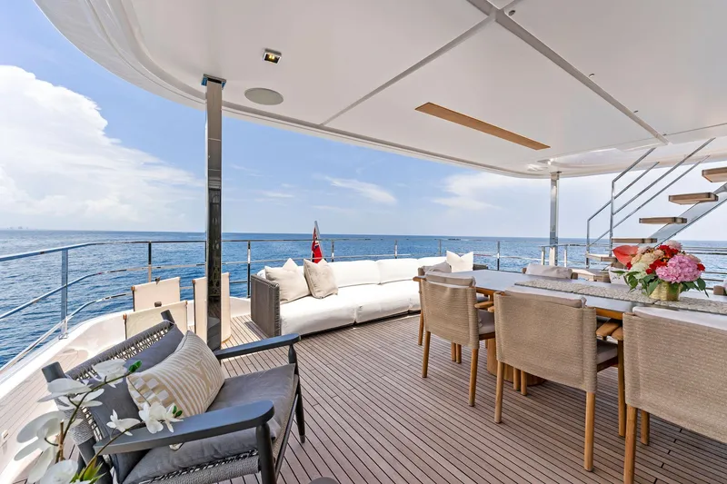Slide: The Image of Luxurious 2024 Custom Line Navetta 33 yacht deck with elegant seating and ocean view. - 45