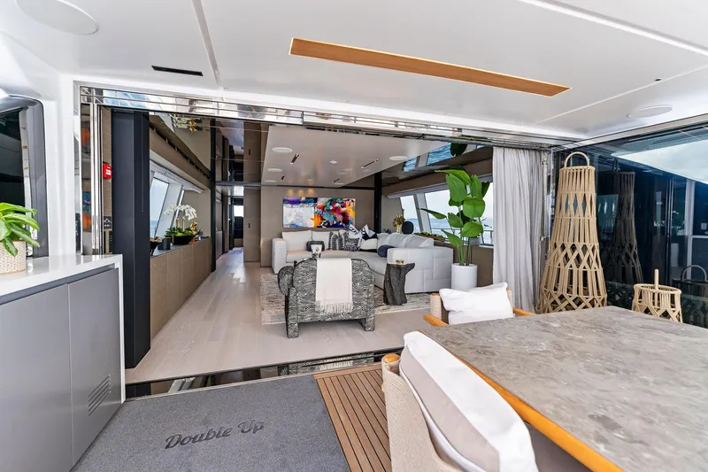 Slide: The Image of Luxurious interior of 2024 Custom Line Navetta 33 yacht with modern decor and spacious seating. - 47