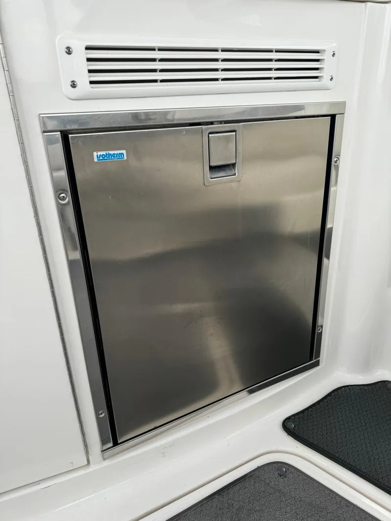 Slide: The Image of Stainless steel refrigerator on 2005 Chaparral Signature 310 boat. - 12