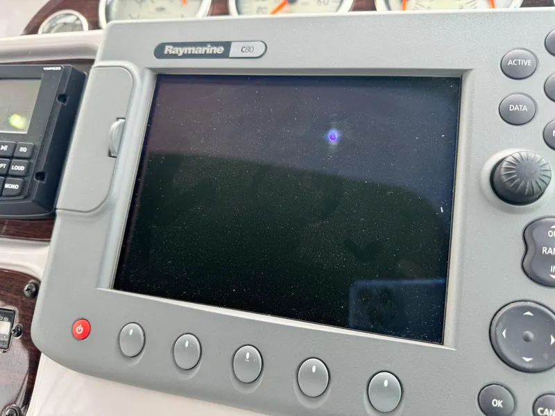 Slide: The Image of Raymarine C80 display on 2005 Chaparral Signature 310 boat dashboard. - 16