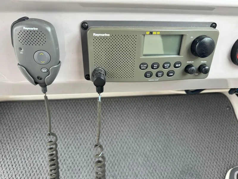 Slide: The Image of Raymarine marine radio system on 2005 Chaparral Signature 310 boat dashboard. - 19