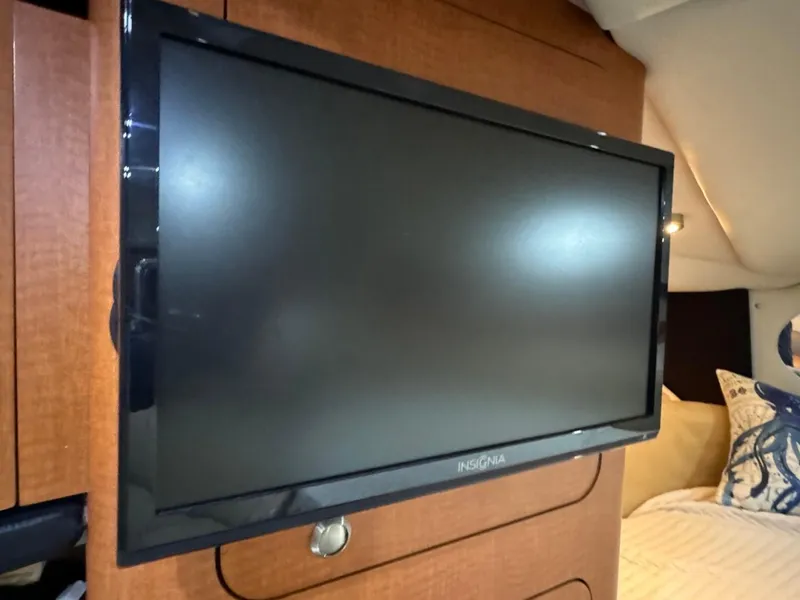Slide: The Image of Flat-screen TV inside 2005 Chaparral Signature 310 boat cabin. - 37