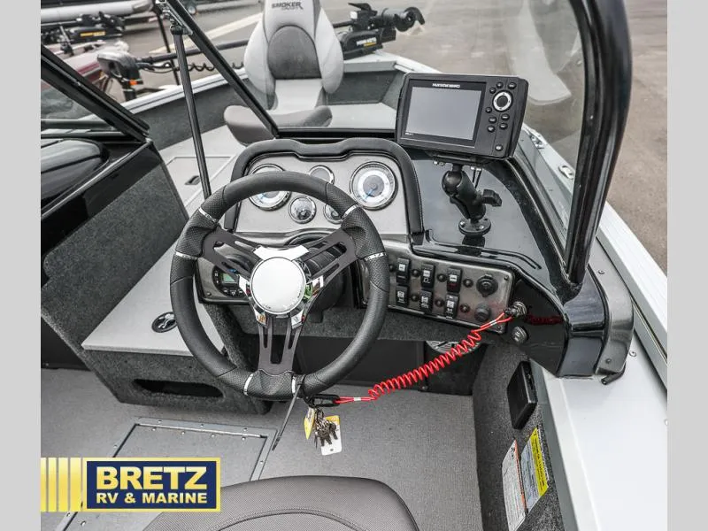 Slide: The Image of 2020 Pro Angler XL 172 XL boat dashboard with steering wheel and navigation system. - 15
