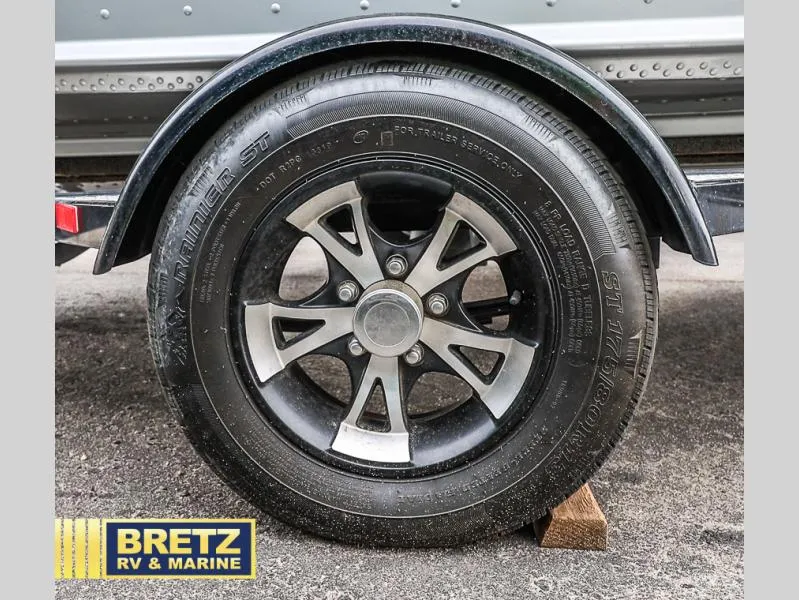 Slide: The Image of Pro Angler XL 172 XL 2020 trailer wheel with black alloy rim at Bretz RV & Marine. - 24