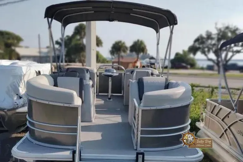 The Image of 2025 Sylvan Mirage 822 LZ pontoon boat with canopy, parked outdoors. - 0