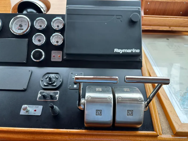 Slide: The Image of Control panel of a 1986 Wilbur Hunt Yacht with Raymarine navigation system. - 29