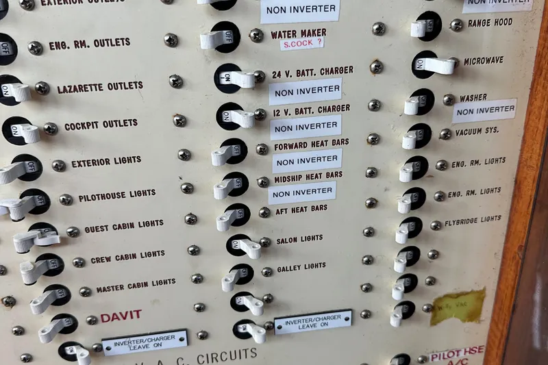 Slide: The Image of Electrical panel with labeled switches on a 1986 Wilbur Hunt Yachts boat. - 43