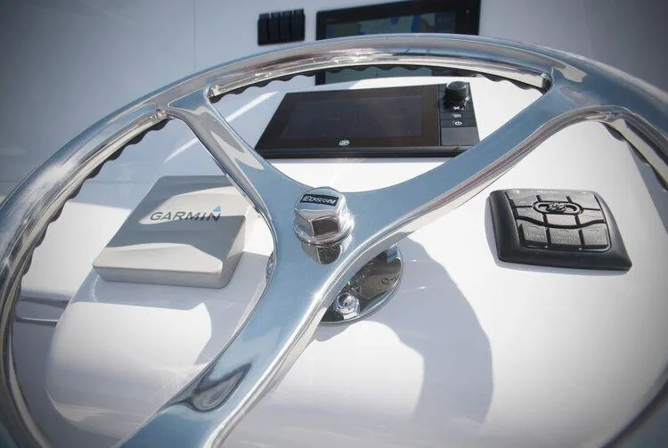 Slide: The Image of Steering wheel of 2025 Maverick Yachts Costa Rica 36 Walkaround with Garmin navigation system. - 6