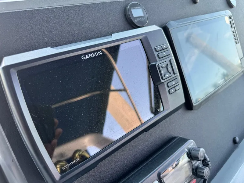 Slide: The Image of Garmin Striker display on 2000 Tiara Yachts 3100 Open dashboard. - 42