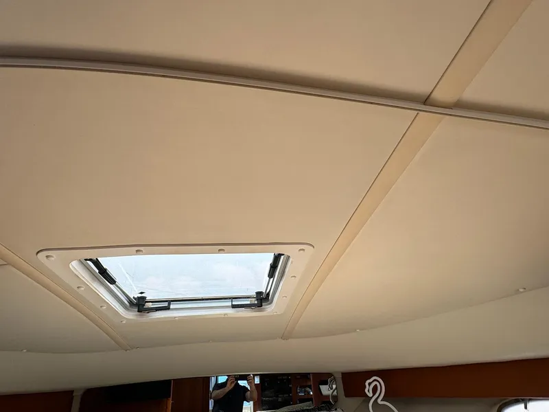Slide: The Image of Ceiling view of 2000 Tiara Yachts 3100 Open with a skylight. - 9