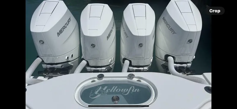 Slide: The Image of 2023 Yellowfin 39 Offshore boat with four Mercury outboard engines. - 11