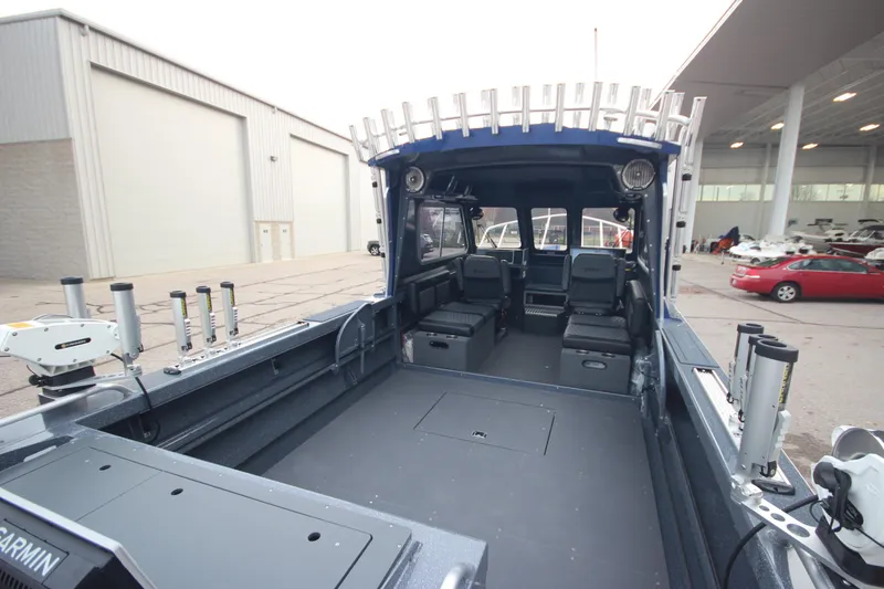 Slide: The Image of 2025 Weldcraft 240 Ocean King boat interior, spacious seating, equipped for Great Lakes fishing. - 2