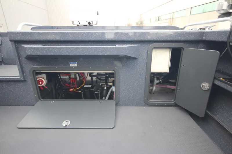 Slide: The Image of 2025 Weldcraft 240 Ocean King boat storage compartments and interior view. - 22