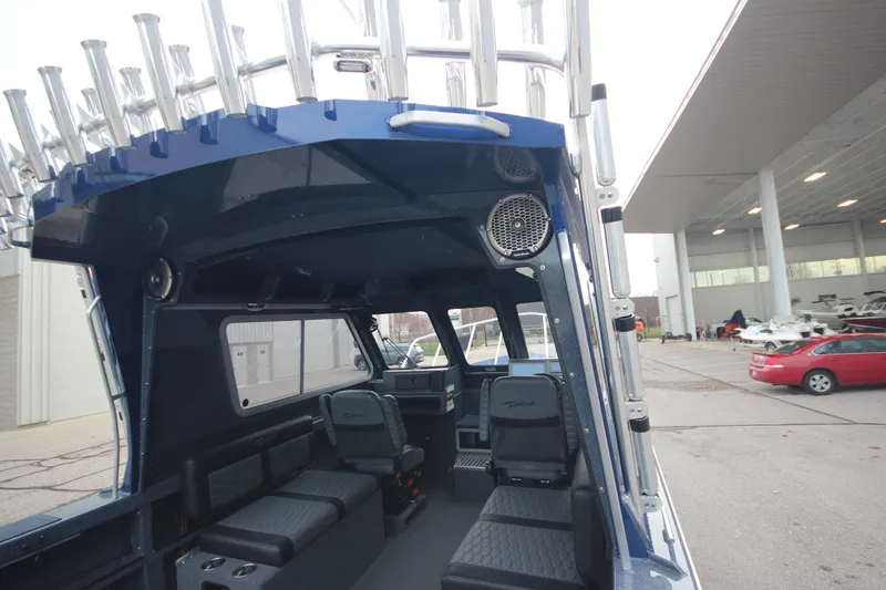 Slide: The Image of 2025 Weldcraft 240 Ocean King boat interior, featuring spacious seating and modern design. - 28