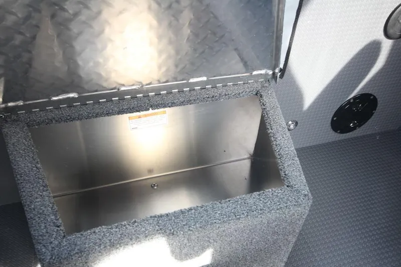 Slide: The Image of Open storage compartment in 2025 Weldcraft 240 Ocean King boat. - 42