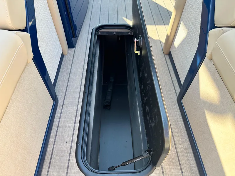 Slide: The Image of Open storage compartment on Balise HORIZON 24L boat, 2025 model. - 17