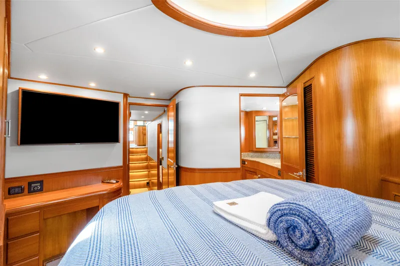 Slide: The Image of Luxurious cabin interior of 2007 Fleming 65 yacht with modern amenities and elegant wood finishes. - 17