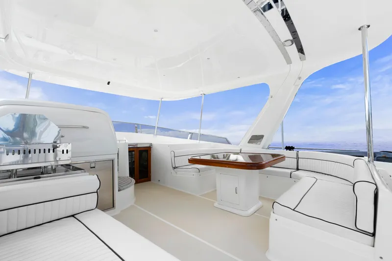 Slide: The Image of Luxurious 2007 Fleming 65 yacht interior with elegant seating and dining area. - 40