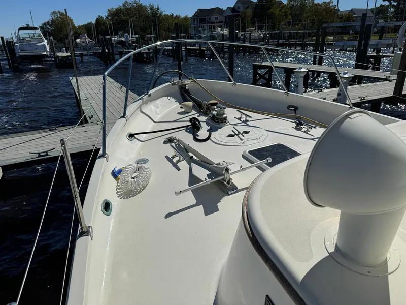 Slide: The Image of 1989 Seaton Ross 56 Trawler docked at marina, sunny day, calm waters. - 10