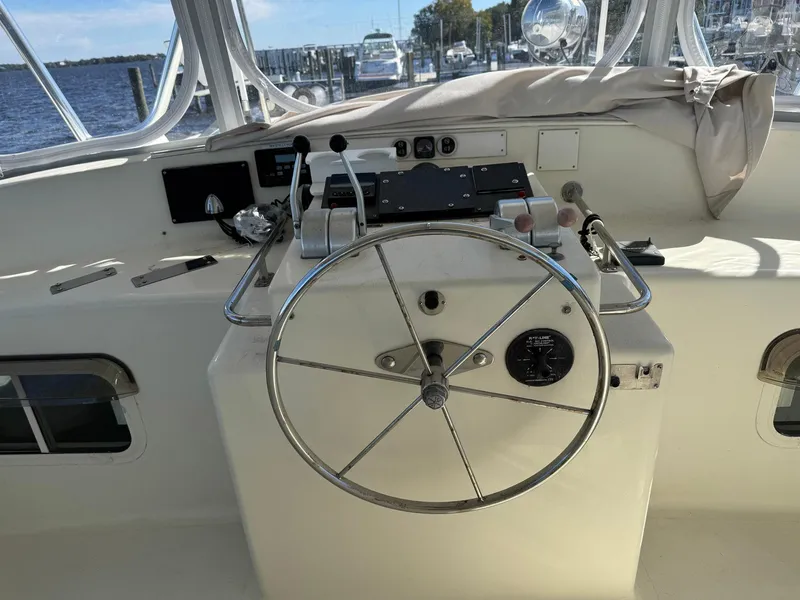 Slide: The Image of Helm of 1989 Seaton Ross 56 Trawler with steering wheel and controls. - 18