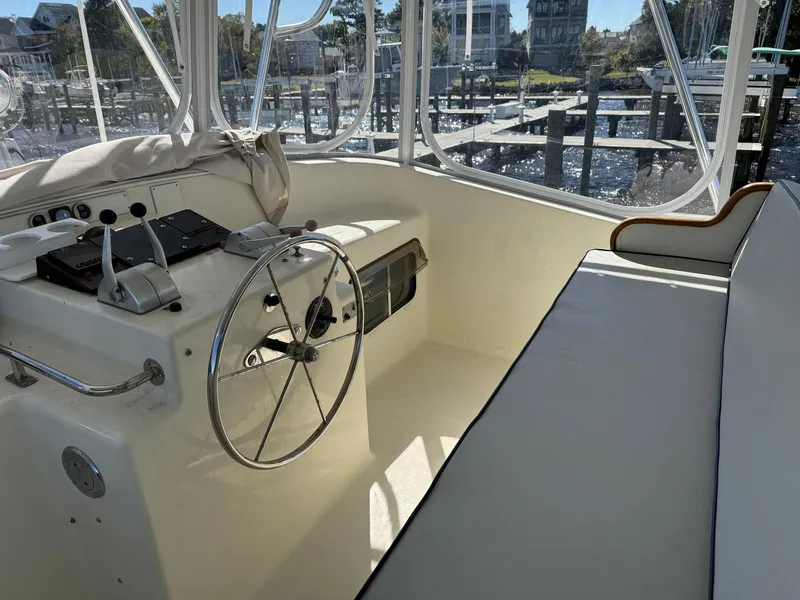 Slide: The Image of Interior helm of 1989 Seaton Ross 56 Trawler with steering wheel and controls. - 21