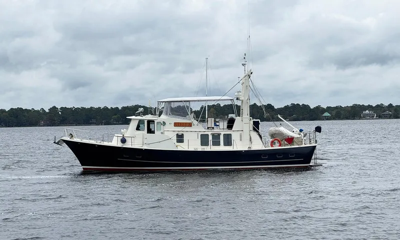 Slide: The Image of Seaton Ross 56 Trawler, 1989 model, cruising on a cloudy day. - 4