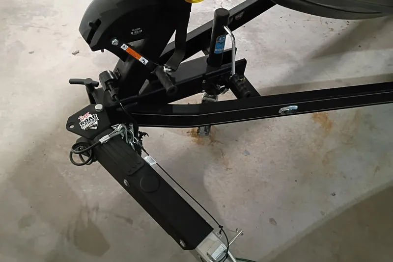 Slide: The Image of Trailer hitch of 2025 Ranger Z521 boat on concrete floor. - 10