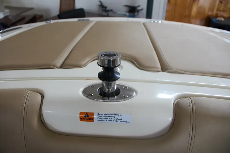 Slide: The Image of 2014 Chris-Craft Launch 22 boat with beige upholstery and a ski tow pylon. - 29