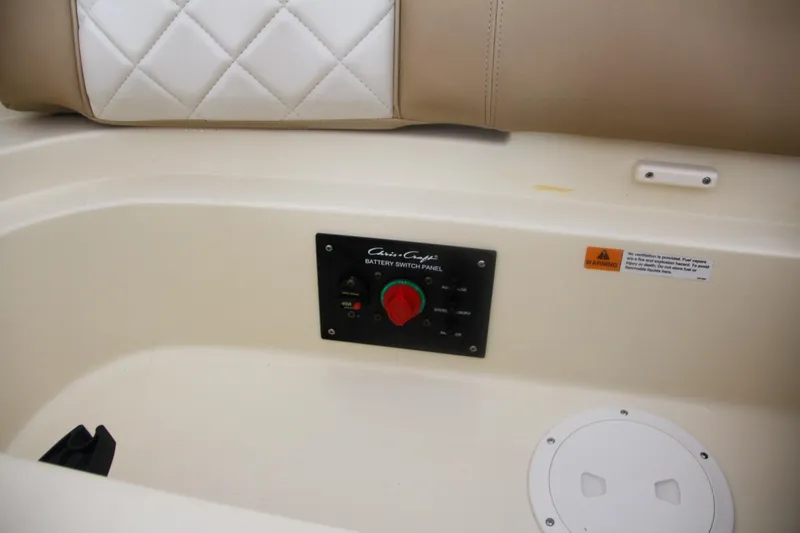 Slide: The Image of 2014 Chris-Craft Launch 22 battery switch panel with quilted seat detail. - 33