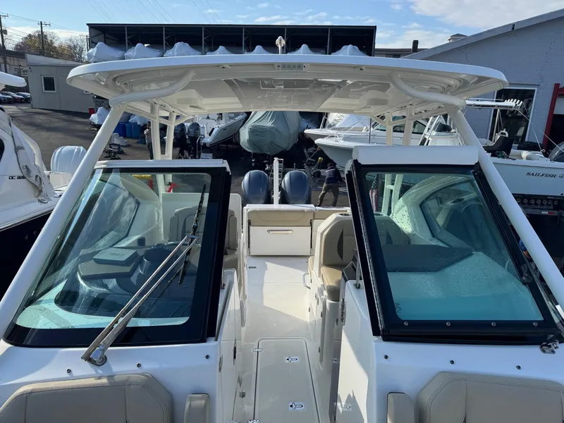 Slide: The Image of 2020 Pursuit DC 266 Dual Console boat with spacious seating and modern design. - 42