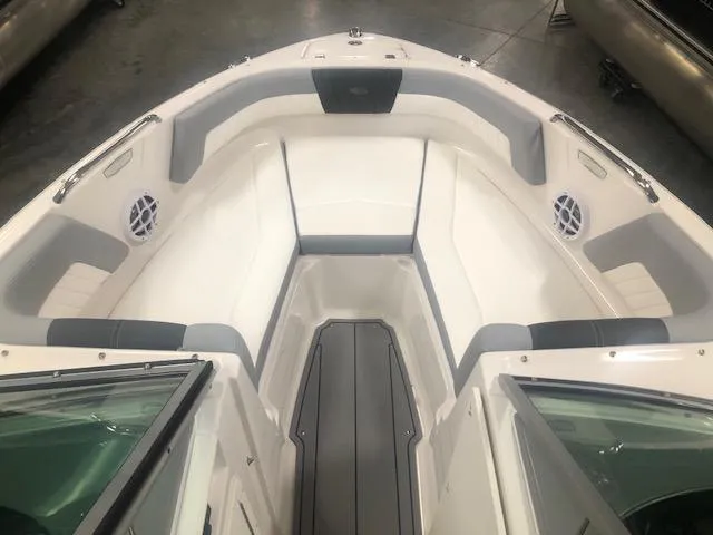 Slide: The Image of Interior of 2025 Chaparral 21 SSi boat with white and gray seating. - 11