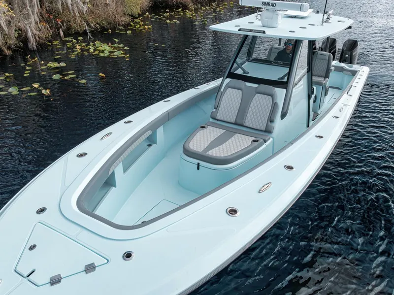 Slide: The Image of 2024 Front Runner 36 Center Console boat on calm water. - 10