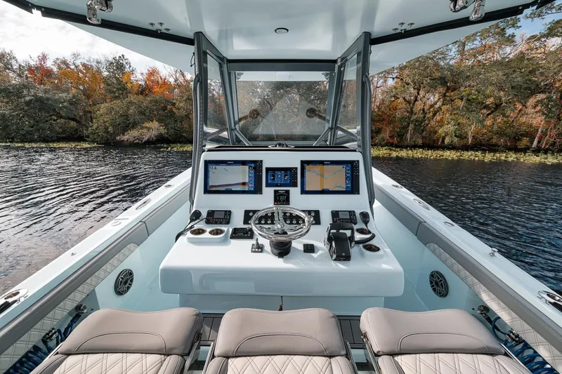 Slide: The Image of 2024 Front Runner 36 Center Console boat interior with advanced navigation system. - 40