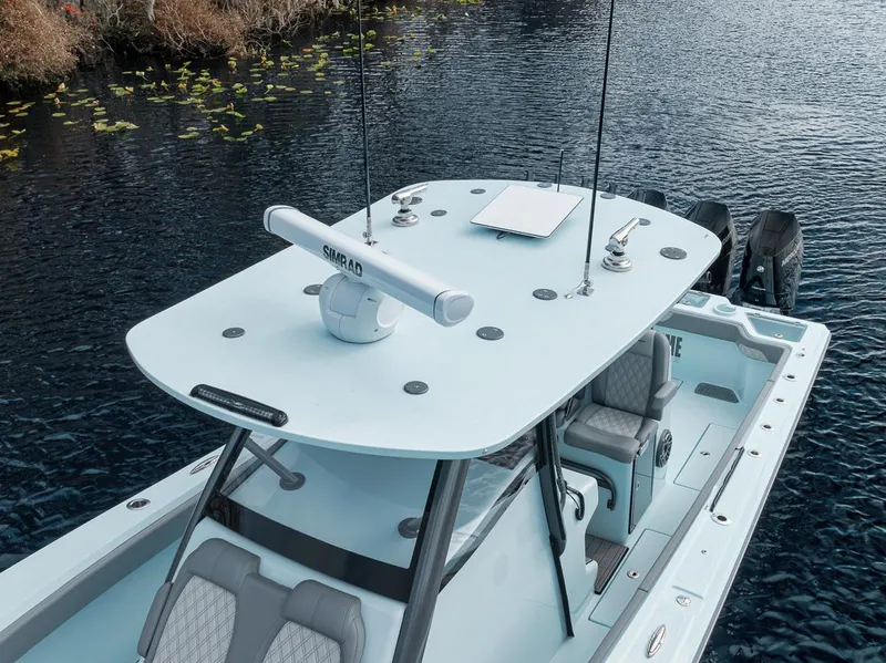 Slide: The Image of 2024 Front Runner 36 Center Console boat on water, featuring sleek design and advanced equipment. - 8