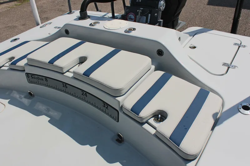 Slide: The Image of Tiburon ZX-25 boat seating area with striped cushions, 2017 model. - 12
