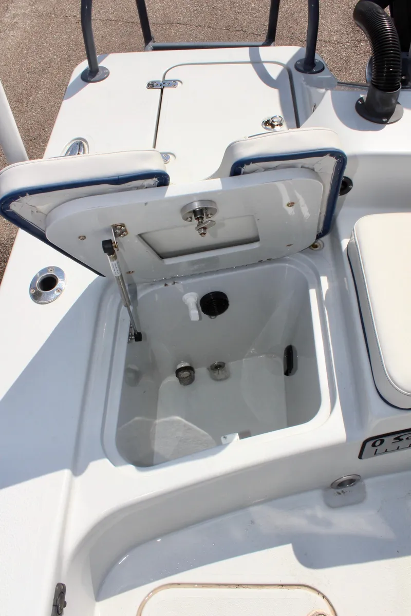 Slide: The Image of Open storage compartment on 2017 Tiburon ZX-25 boat deck. - 16