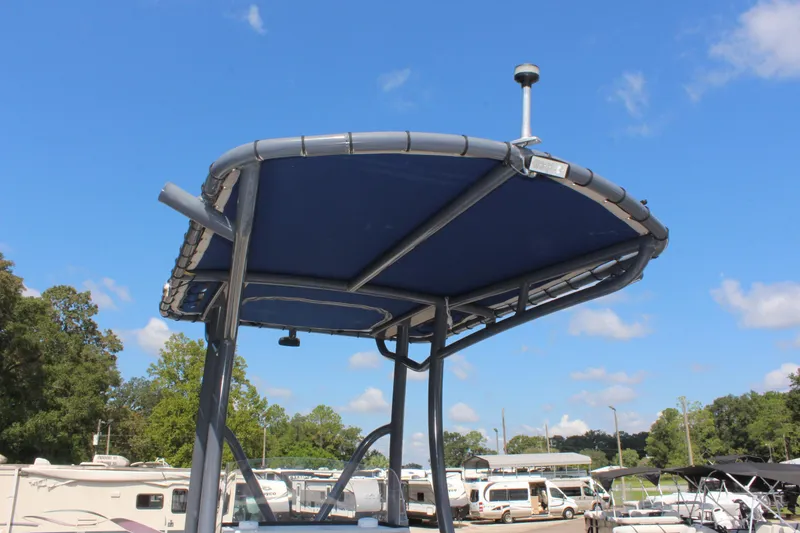 Slide: The Image of 2017 Tiburon ZX-25 boat canopy against a clear blue sky. - 18