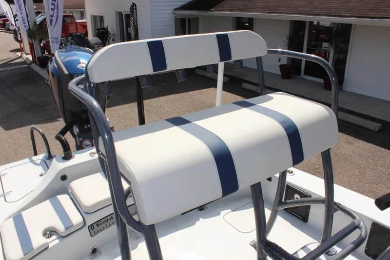 Slide: The Image of 2017 Tiburon ZX-25 boat seat with blue and white stripes. - 24