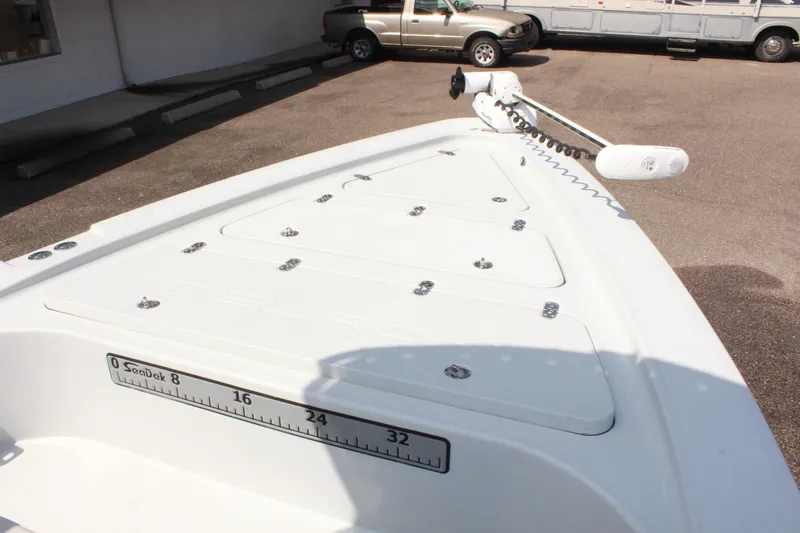 Slide: The Image of 2017 Tiburon ZX-25 boat deck with storage compartments and measuring scale. - 26