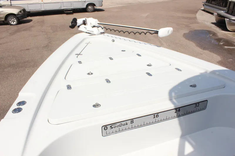 Slide: The Image of 2017 Tiburon ZX-25 boat deck with SeaDek ruler and trolling motor. - 27