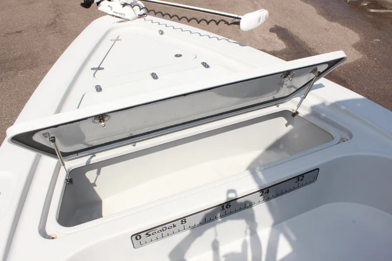 Slide: The Image of Open storage compartment on 2017 Tiburon ZX-25 boat deck. - 28