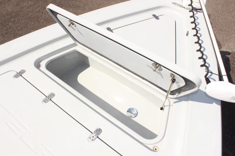Slide: The Image of Open storage compartment on 2017 Tiburon ZX-25 boat deck. - 30