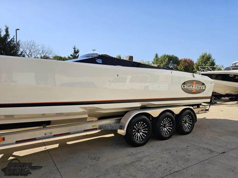 Slide: The Image of 2003 Cigarette 36 Gladiator boat on trailer, side view. - 28
