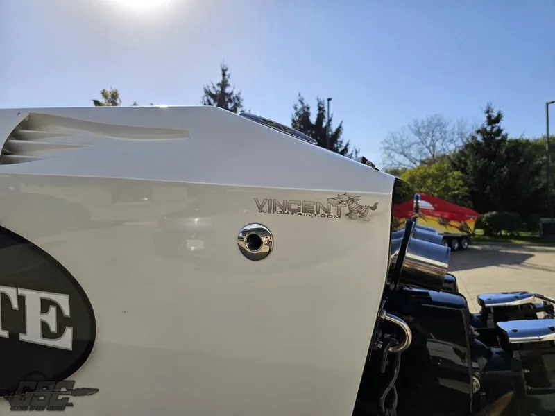 Slide: The Image of Close-up of 2003 Cigarette 36 Gladiator boat engine detail in sunlight. - 35