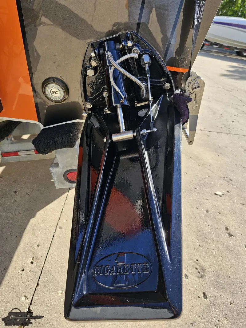 Slide: The Image of Close-up of 2003 Cigarette 36 Gladiator boat part, featuring detailed mechanical components. - 38