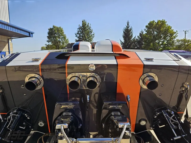 Slide: The Image of 2003 Cigarette 36 Gladiator boat with dual Mercury engines, rear view. - 40